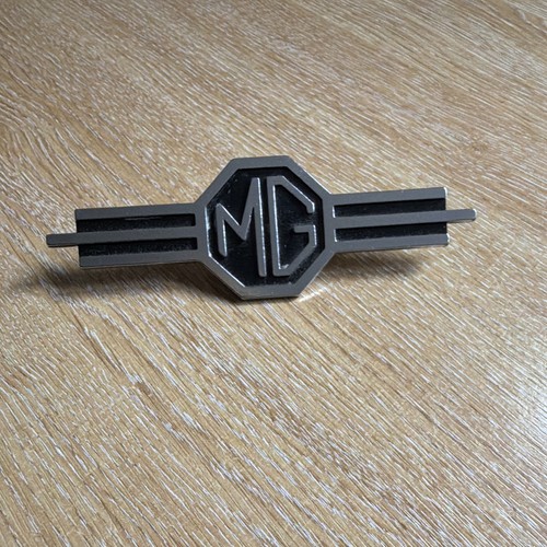 Badge - mg,