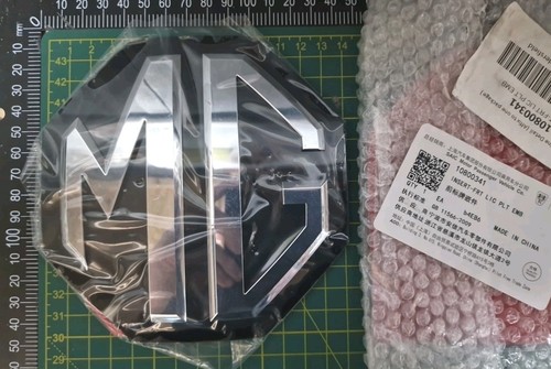 Genuine new grille badge - grille,